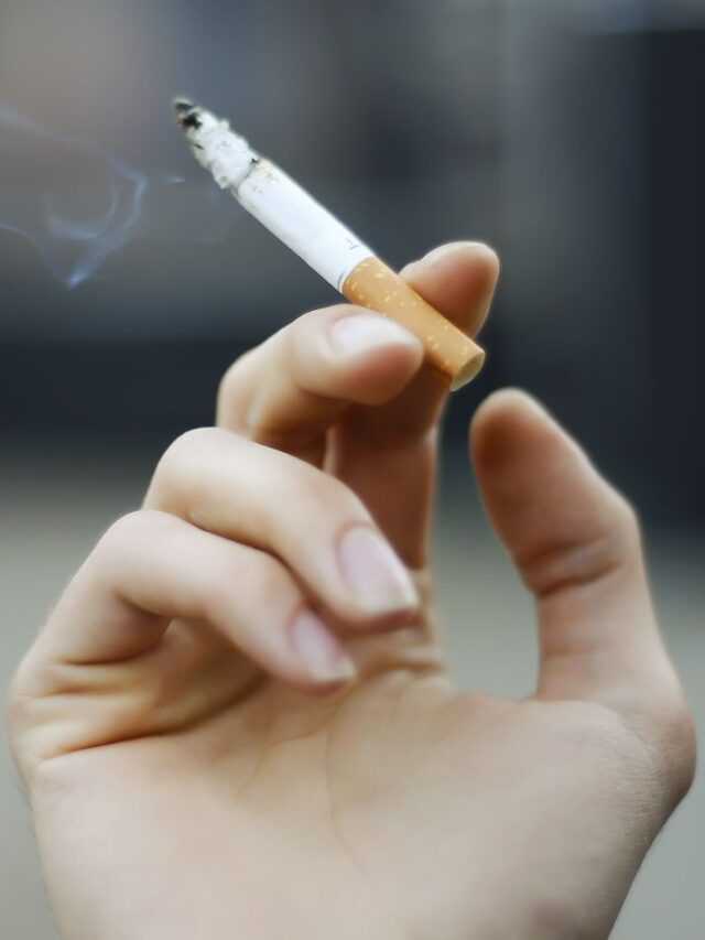 cigarette-in-the-hand-479880794-90a614e35399442691731b8aaba9e064